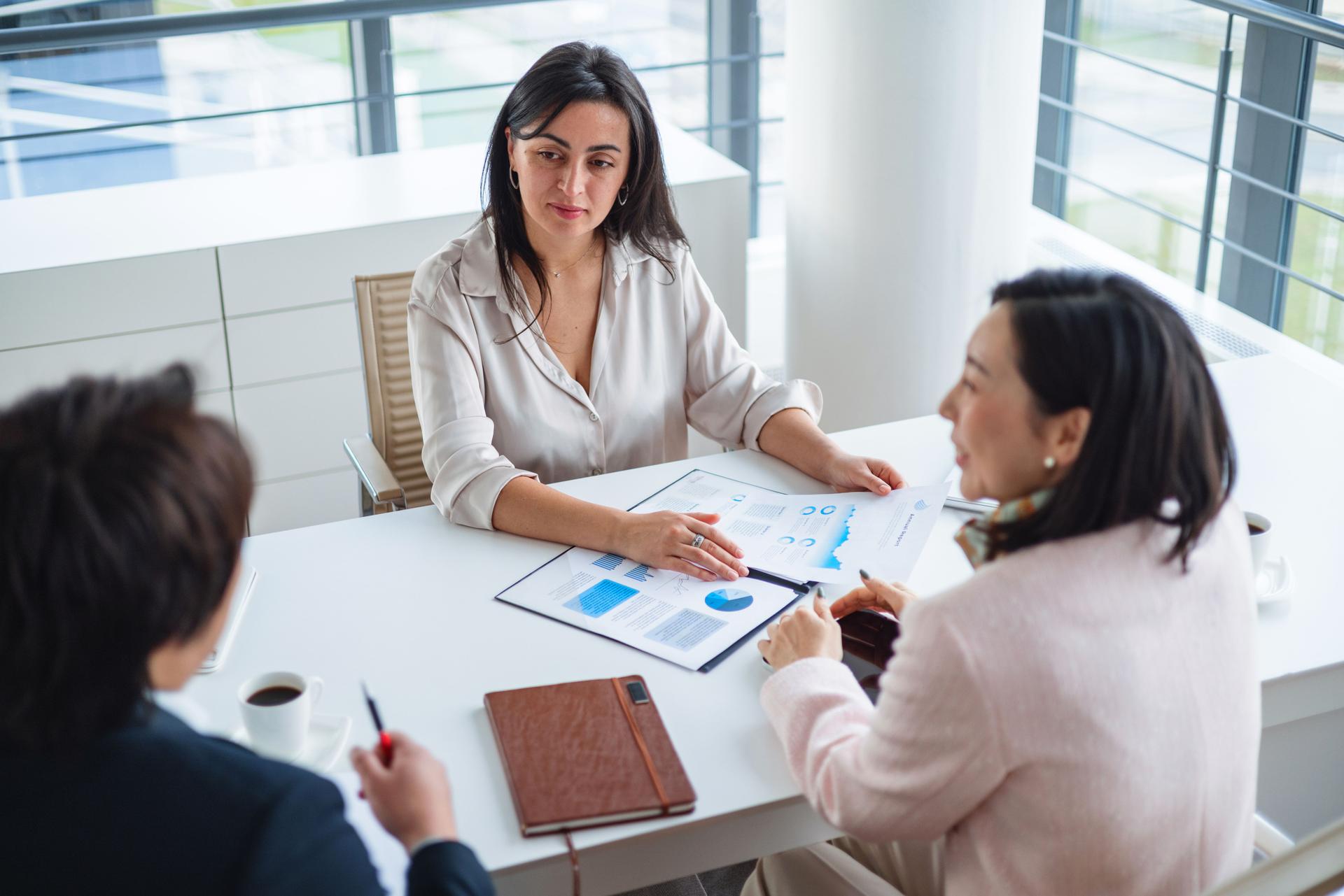 Businesswomen in a Meeting with Discussions and Planning